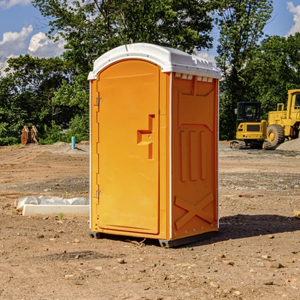 what is the cost difference between standard and deluxe portable restroom rentals in May